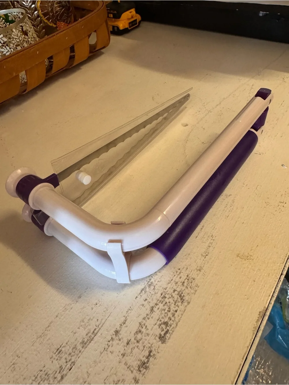 Wilton White and Purple cake leveling cutter
